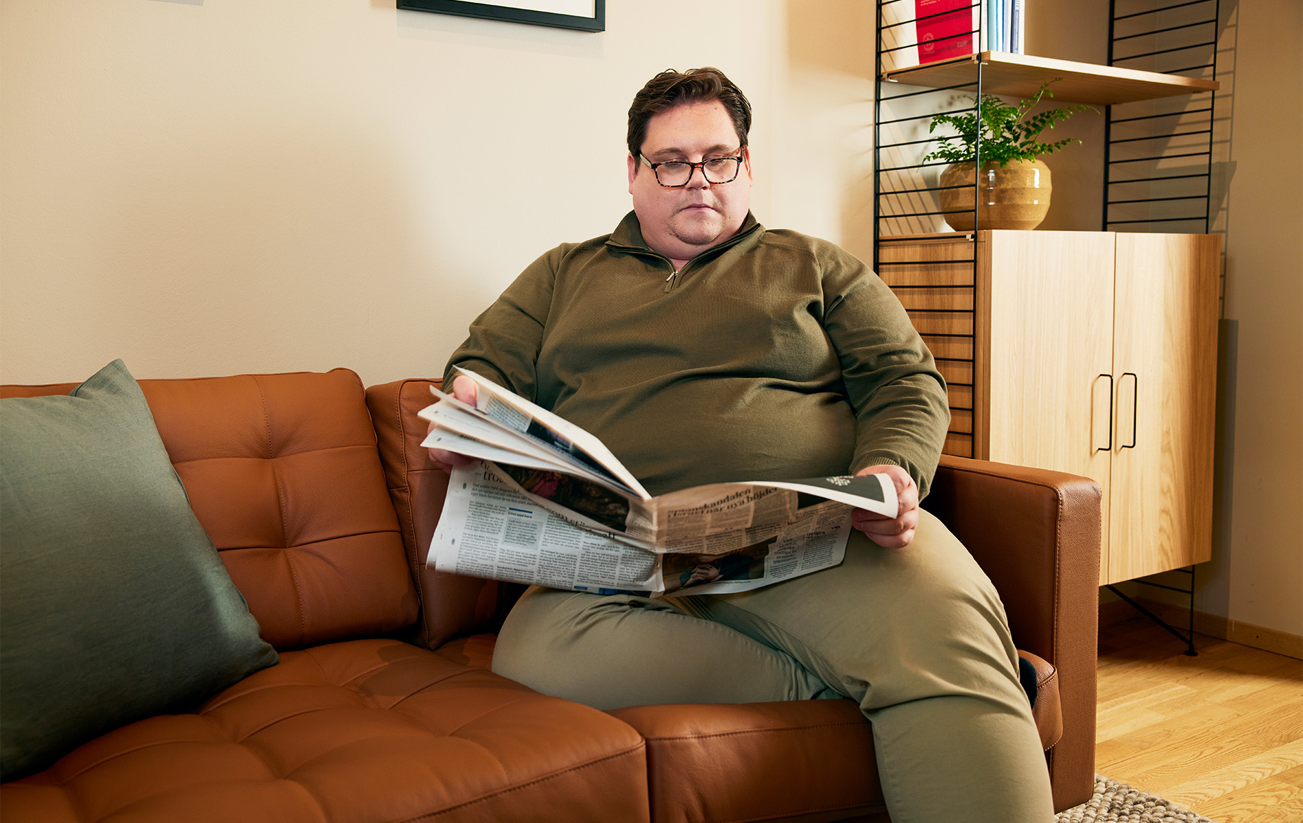 man reading the newspaper